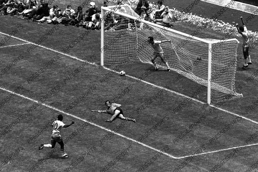 21 June 1970 - FIFA World Cup Final - Brazil v Italy - Brazil captain Carlos Alberto (4) runs off to celebrate scoring Brazils fourth and final goal with teammate Tostao in the net and Pele (10) coming to join the celebrations But 4-1 