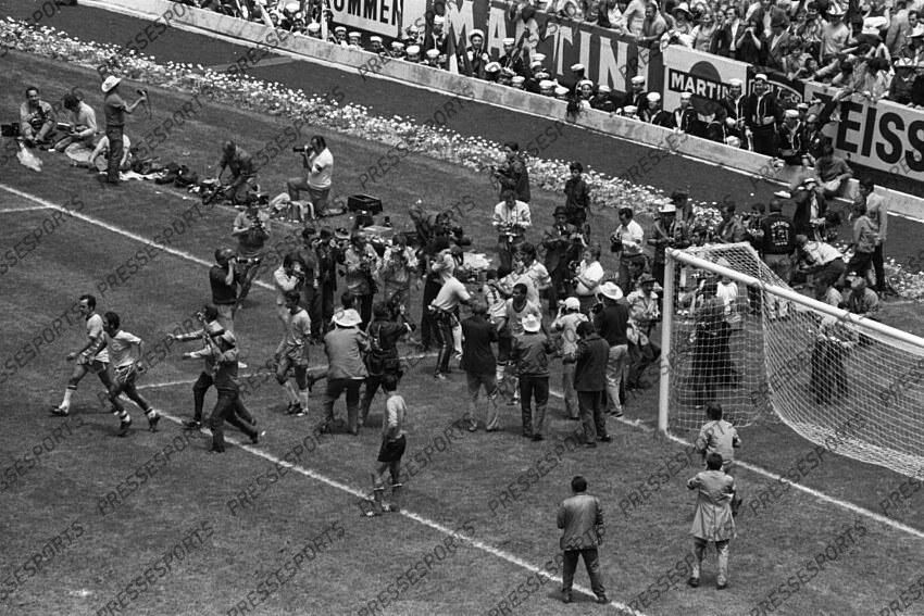 21 June 1970 - FIFA World Cup Final - Brazil v Italy - Photographers swarm the Brazilian players after the celebration of the fourth goal. But 4-1 