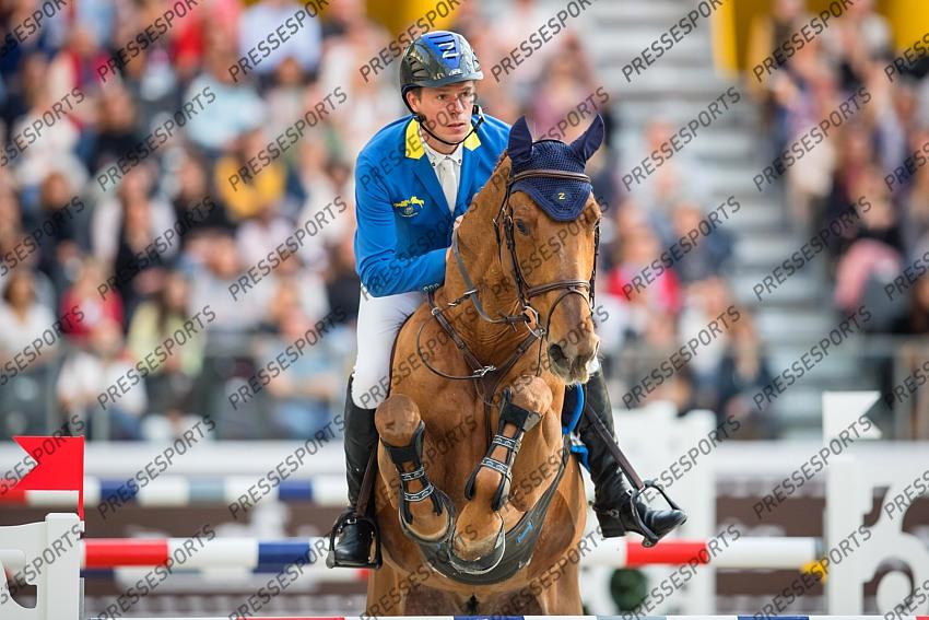 Photographie Eric KNOLL. Saut Hermes 2019. Jumping CSI 5. Christian AHLMANN (GER). CARIBIS Z 
