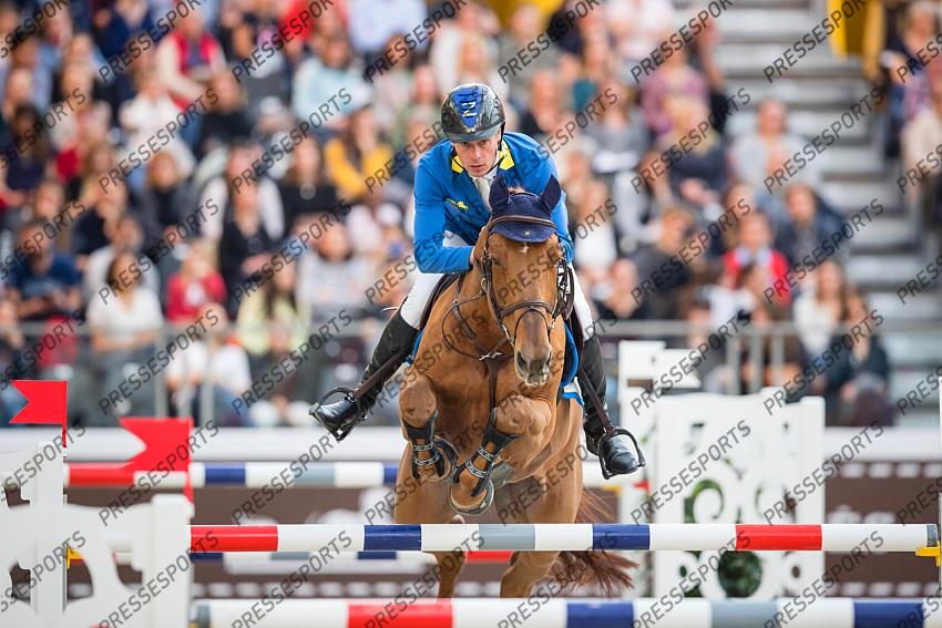 Photographie Eric KNOLL. Saut Hermes 2019. Jumping CSI 5. Christian AHLMANN (GER). CARIBIS Z 