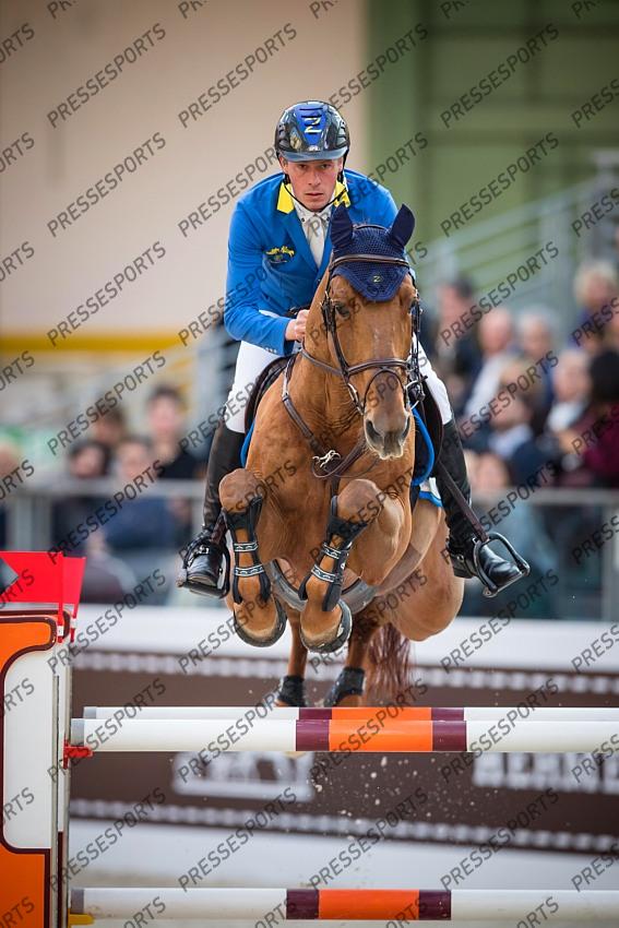 Photographie Eric KNOLL. Saut Hermes 2019. Jumping CSI 5. Christian AHLMANN (GER). CARIBIS Z 