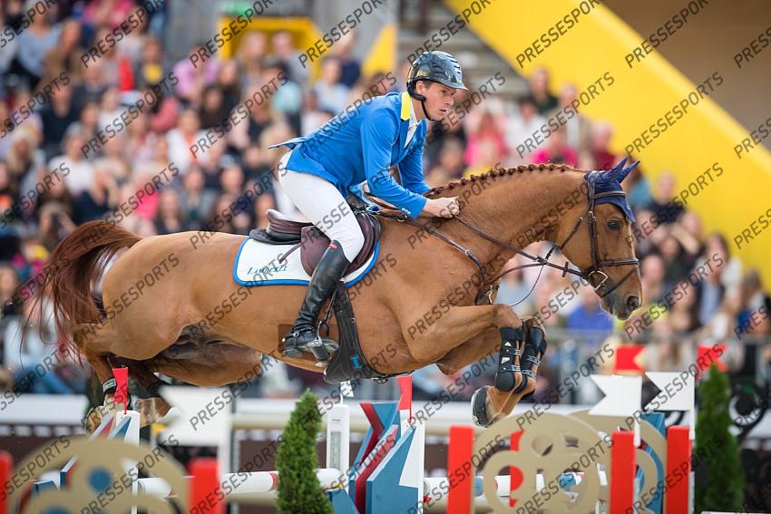 Photographie Eric KNOLL. Saut Hermes 2019. Jumping CSI 5. Christian AHLMANN (GER). CARIBIS Z 