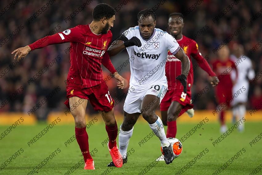 24 February 2020, Liverpool - Premier League Football - Liverpool v West Ham United. Michail Antonio of West Ham United takes on Joe Gomez of Liverpool (photo by Daniel Chesterton) 