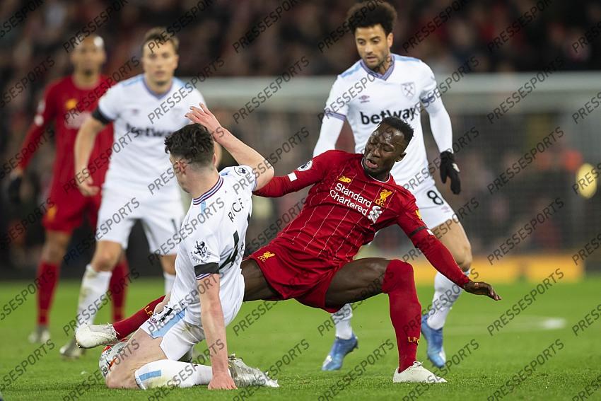 24 February 2020, Liverpool - Premier League Football - Liverpool v West Ham United. Naby Keita of Liverpool is tackled by Declan Rice of West Ham United (photo by Daniel Chesterton) 