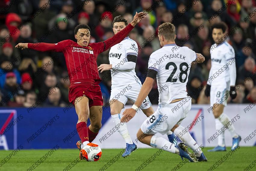 24 February 2020, Liverpool - Premier League Football - Liverpool v West Ham United. Trent Alexander-Arnold of Liverpool is tackled by Tomas Soucek of West Ham United (photo by Daniel Chesterton) 