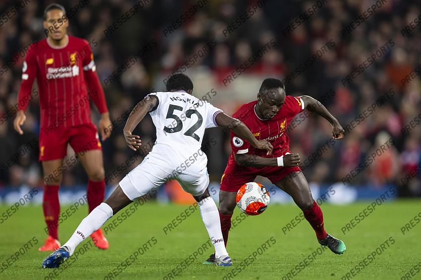 24 February 2020, Liverpool - Premier League Football - Liverpool v West Ham United. Jeremy Ngakia of West Ham United and Sadio Mane of Liverpool (photo by Daniel Chesterton) 