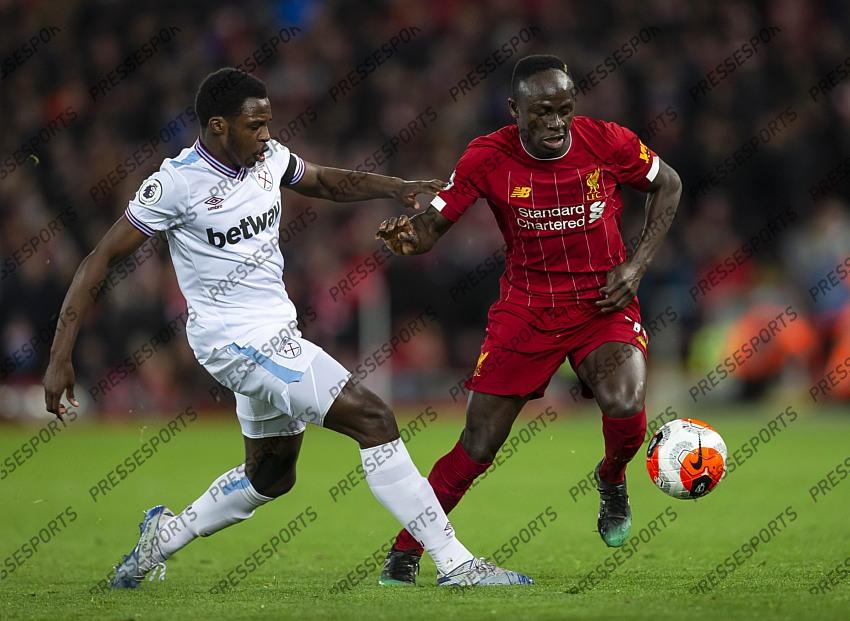 24 February 2020, Liverpool - Premier League Football - Liverpool v West Ham United. Jeremy Ngakia of West Ham United and Sadio Mane of Liverpool (photo by Daniel Chesterton) 
