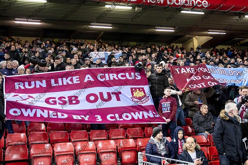 24 February 2020, Liverpool - Premier League Football - Liverpool v West Ham United. West Ham United fans protest against their board before the match (photo by Daniel Chesterton) 