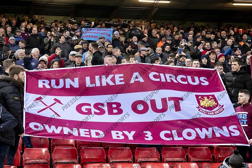 24 February 2020, Liverpool - Premier League Football - Liverpool v West Ham United. West Ham United fans protest against their board before the match (photo by Daniel Chesterton) 