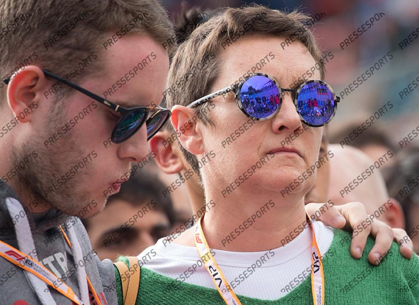 French driver Anthoine Hubert's relative and mother pictured during a minute of silence for deceased French pilot Anthoine Hubert, before the Spa-Francorchamps Formula One Grand Prix of Belgium race, in Spa-Francorchamps, Sunday 01 September 2019. The 22-year-old Hubert was killed in a crash yesterday, during the Formula 2 feature race on the Spa-Francorchamps track. BELGA PHOTO BENOIT DOPPAGNE 