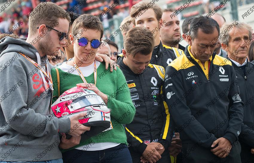 French driver Anthoine Hubert's relative, mother, teammate and Former French driver Alain Prost pictured during a minute of silence for deceased French pilot Anthoine Hubert, before the Spa-Francorchamps Formula One Grand Prix of Belgium race, in Spa-Francorchamps, Sunday 01 September 2019. The 22-year-old Hubert was killed in a crash yesterday, during the Formula 2 feature race on the Spa-Francorchamps track. BELGA PHOTO BENOIT DOPPAGNE 