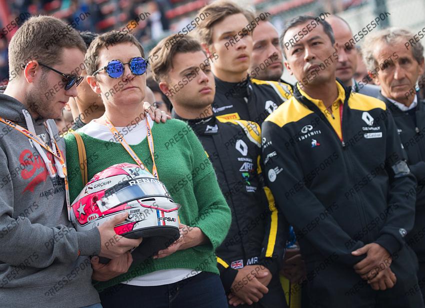 French driver Anthoine Hubert's relative, mother, teammate and Former French driver Alain Prost pictured during a minute of silence for deceased French pilot Anthoine Hubert, before the Spa-Francorchamps Formula One Grand Prix of Belgium race, in Spa-Francorchamps, Sunday 01 September 2019. The 22-year-old Hubert was killed in a crash yesterday, during the Formula 2 feature race on the Spa-Francorchamps track. BELGA PHOTO BENOIT DOPPAGNE 