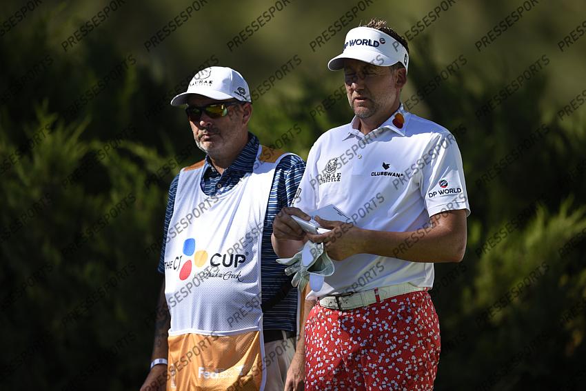 Oct 15, 2020; Las Vegas, Nevada, USA; Ian Poulter stands with his caddie James Walton on the fifth hole during the first round of the CJ Cup golf tournament at Shadow Creek Golf Course. Mandatory Credit: Kelvin Kuo-USA TODAY Sports 
