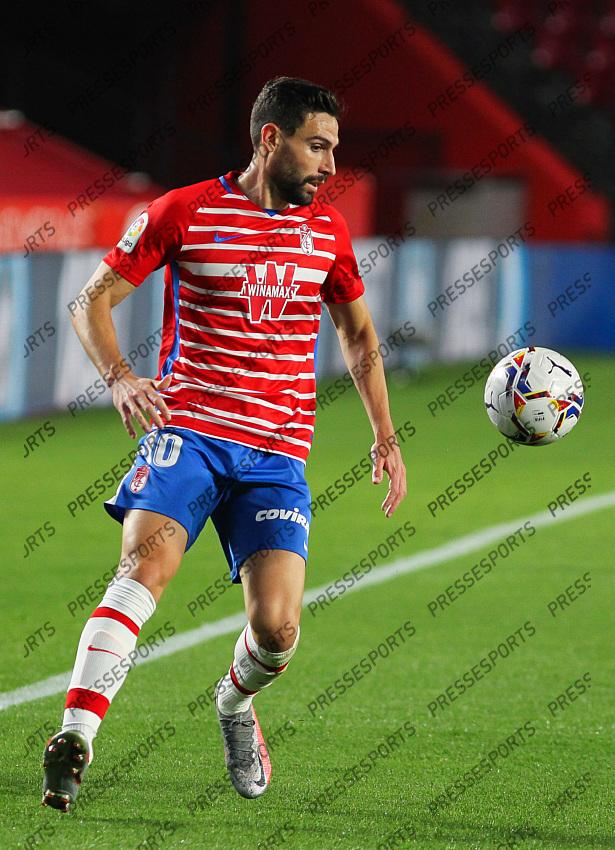 Antonio Puertas of Granada CF in action during the La Liga football match played between Granada CF and Levante UD at Nuevo los Carmenes stadium on November 01, 2020 in Granada, Spain. 