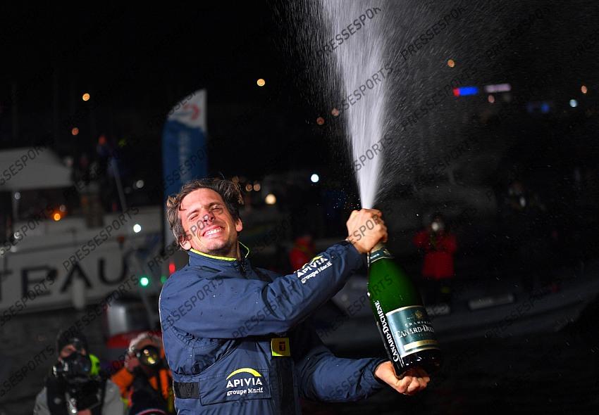 Sailing - Vendee Globe - Les Sables-d'Olonne, France - January 27, 2021 APIVIA's skipper Charlie Dalin celebrates with champagne Pool via REUTERS/Loic Venance 
