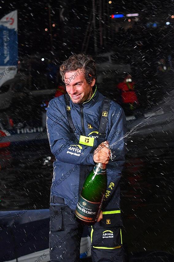 French skipper Charlie Dalin, 36, who sailed his Imoca 60 monohull 'Apivia' in the 2020/2021 ninth edition of the Vendee Globe round-the-world solo race, celebrates after crossing the finish line at Les Sables d'Olonne, western France, on January 27, 2021, - Dalin completed the epic race in 80 days, six hours, 15 minutes and 47 seconds. However, Germany's Boris Herrmann (SeaExplorer-Yacht Club de Monaco) and France's Yannick Bestaven (Maitre coq IV) are still in the running for the title. (Photo by LOIC VENANCE / POOL / AFP) 