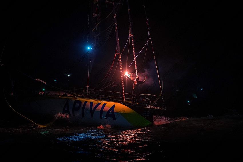 French skipper Charlie Dalin, 36, sails his Imoca 60 monohull "Apivia" across the finish line in the 2020/2021 ninth edition of the Vendee Globe round-the-world solo race off the coasts of Les Sables d'Olonne, western France, on January 27, 2021, - Dalin completed the epic race in 80 days, six hours, 15 minutes and 47 seconds. However, Germany's Boris Herrmann (SeaExplorer-Yacht Club de Monaco) and France's Yannick Bestaven (Maitre coq IV) are still in the running for the title. (Photo by LOIC VENANCE / POOL / AFP) 