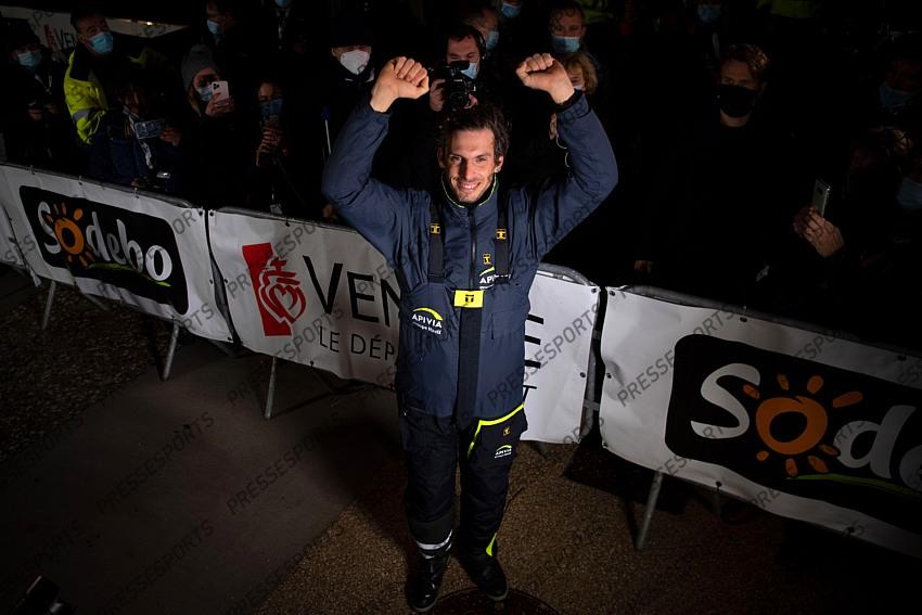 French skipper Charlie Dalin, 36, who sailed his Imoca 60 monohull 'Apivia' in the 2020/2021 ninth edition of the Vendee Globe round-the-world solo race, celebrates after crossing the finish line at Les Sables d'Olonne, western France, on January 27, 2021. - Dalin completed the epic race in 80 days, six hours, 15 minutes and 47 seconds. However, Germany's Boris Herrmann (SeaExplorer-Yacht Club de Monaco) and France's Yannick Bestaven (Maitre coq IV) are still in the running for the title. (Photo by LOIC VENANCE / POOL / AFP) 
