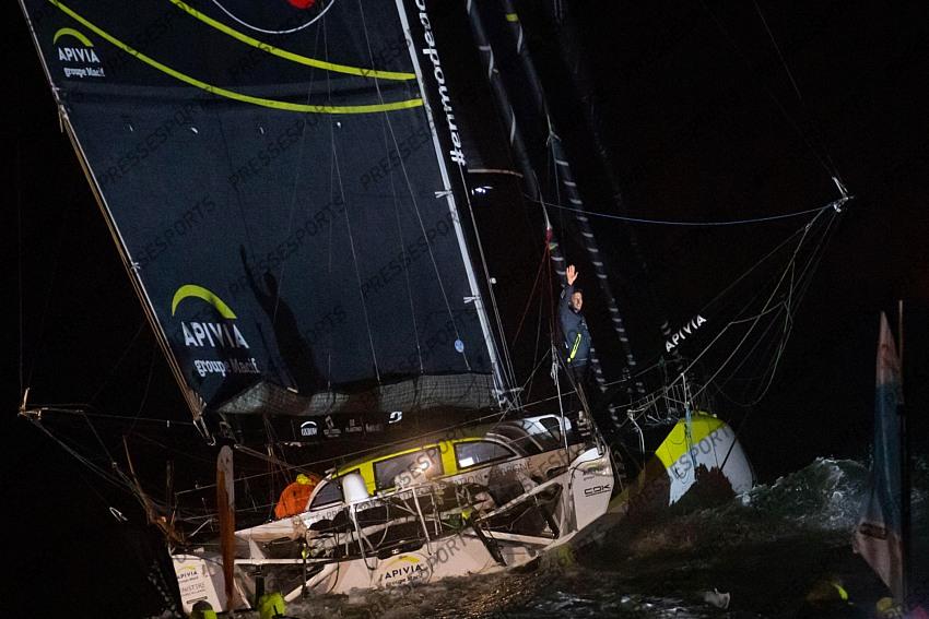 French skipper Charlie Dalin, 36, who sailed his Imoca 60 monohull 'Apivia' in the 2020/2021 ninth edition of the Vendee Globe round-the-world solo race, celebrates after crossing the finish line at Les Sables d'Olonne, western France, on January 27, 2021. - Dalin completed the epic race in 80 days, six hours, 15 minutes and 47 seconds. However, Germany's Boris Herrmann (SeaExplorer-Yacht Club de Monaco) and France's Yannick Bestaven (Maitre coq IV) are still in the running for the title. (Photo by LOIC VENANCE / POOL / AFP) 