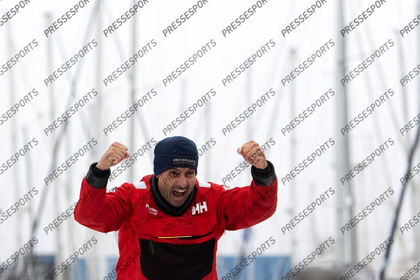 Italian skipper Giancarlo Pedote reacts after crossing the finish line of the Vendee Globe round-the-world solo sailing race, at Les Sables d'Olonne, western France, Thursday, Jan. 28, 2021. French sailor Yannick Bestaven won the Vendee Globe solo round-the-world race after more than 80 days and an unusually close final few hours to determine the winner on Thursday. (Loic Venance, Pool via AP) 