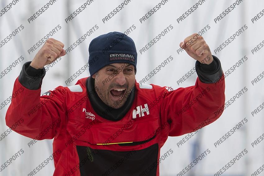 Italian skipper Giancarlo Pedote reacts after crossing the finish line of the Vendee Globe round-the-world solo sailing race, at Les Sables d'Olonne, western France, Thursday, Jan. 28, 2021. French sailor Yannick Bestaven won the Vendee Globe solo round-the-world race after more than 80 days and an unusually close final few hours to determine the winner on Thursday. (Loic Venance, Pool via AP) 
