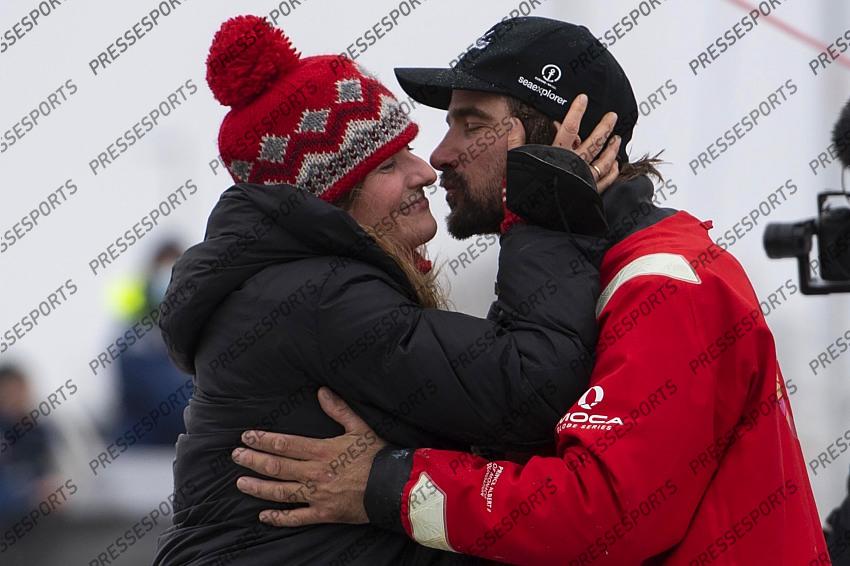 German skipper Boris Herrmann is to his his wife Birte Lorenzen after crossing the finish line of the Vendee Globe round-the-world solo sailing race, at Les Sables d'Olonne, western France, Thursday, Jan. 28, 2021. French sailor Yannick Bestaven won the Vendee Globe solo round-the-world race after more than 80 days and an unusually close final few hours to determine the winner on Thursday. (Loic Venance, Pool via AP) 