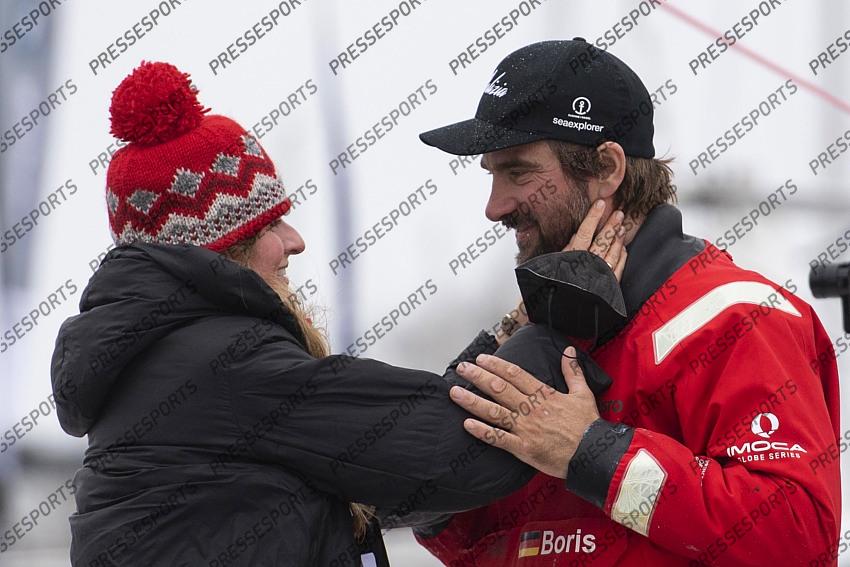 German skipper Boris Herrmann is to his his wife Birte Lorenzen after crossing the finish line of the Vendee Globe round-the-world solo sailing race, at Les Sables d'Olonne, western France, Thursday, Jan. 28, 2021. French sailor Yannick Bestaven won the Vendee Globe solo round-the-world race after more than 80 days and an unusually close final few hours to determine the winner on Thursday. (Loic Venance, Pool via AP) 