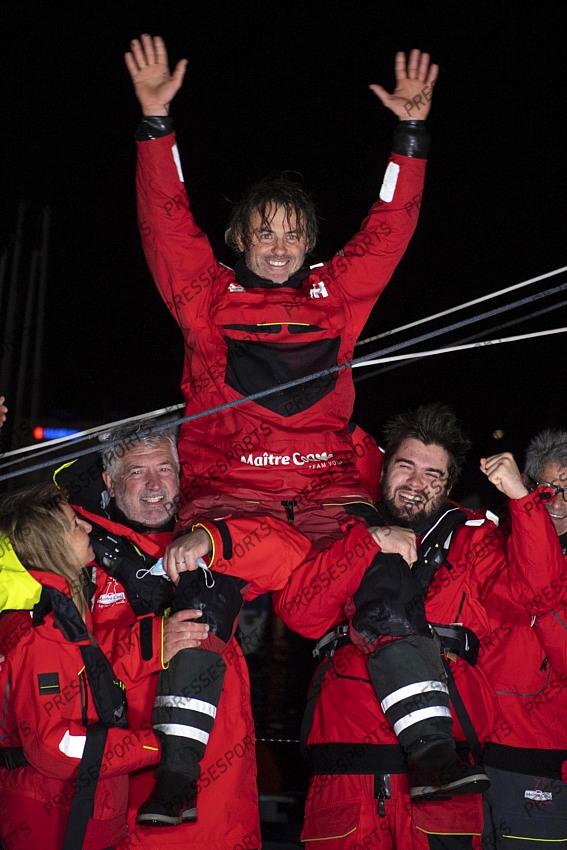 Frenchman Yannick Bestaven celebrates after winning the Vendee Globe solo round-the-world sailing race Thursday, Jan.28, 2021 in Les Sables-d'Olonne, western France. The 48-year-old Bestaven wasn't the first to cross the finish line ‚Äî that honor went to fellow Frenchman Charlie Dalin, who arrived in Les Sables-d'Olonne Wednesday night. (Loic Venance, Pool via AP) 
