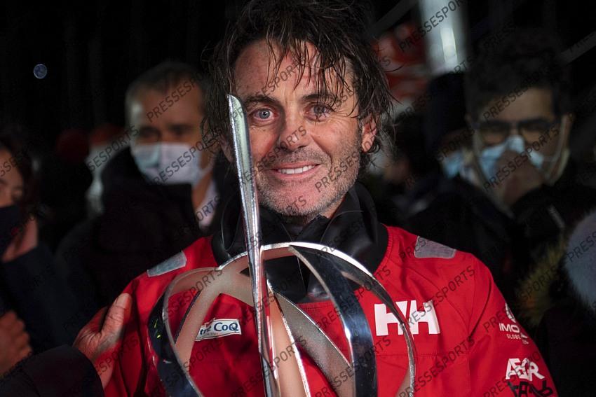 Frenchman Yannick Bestaven holds his trophy after winning the Vendee Globe solo round-the-world sailing race Thursday, Jan.28, 2021 in Les Sables-d'Olonne, western France. The 48-year-old Bestaven wasn't the first to cross the finish line ‚Äî that honor went to fellow Frenchman Charlie Dalin, who arrived in Les Sables-d'Olonne Wednesday night. (Loic Venance, Pool via AP) 