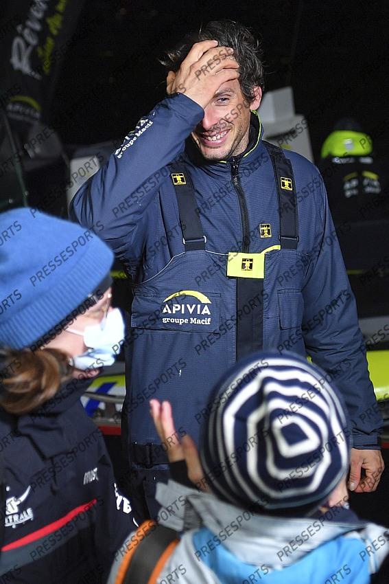 French yachtman Charlie Dalin celebrates with his sister, left, and his mother, after crossing first the finish line of the Vendee Globe solo around-the-world sailing race, in Les Sables-d'Olonne, western France, Wednesday, Jan.27, 2021. The final winner of the race will be decided Thursday as some rival were given a time compensation. (Loic Venance, Pool via AP) 