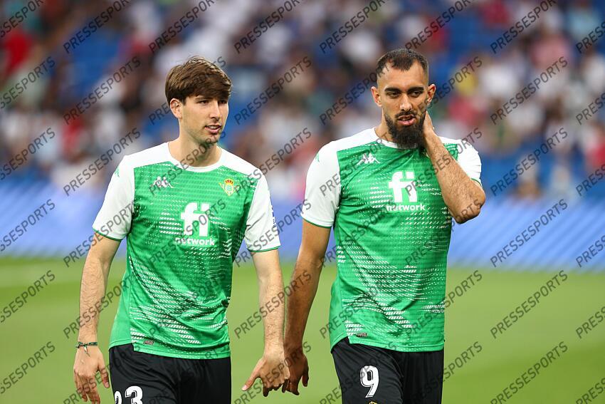 Borja Iglesias of Real Betis talks to Juan Miranda during the spanish league, La Liga Santander, football match played between Real Madrid and Real Betis Balompie at Santiago Bernabeu stadium on May 20, 2022, in Madrid Spain. REAL MADRID-BETIS SEVILLE (0-0) 
