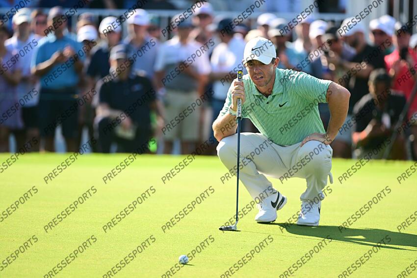 Aug 28, 2022; Atlanta, Georgia, USA; Rory McIlroy lines a putt on the 17th green during the final round of the TOUR Championship golf tournament. Mandatory Credit: Adam Hagy-USA TODAY Sports FINALE FEDEX CUP 