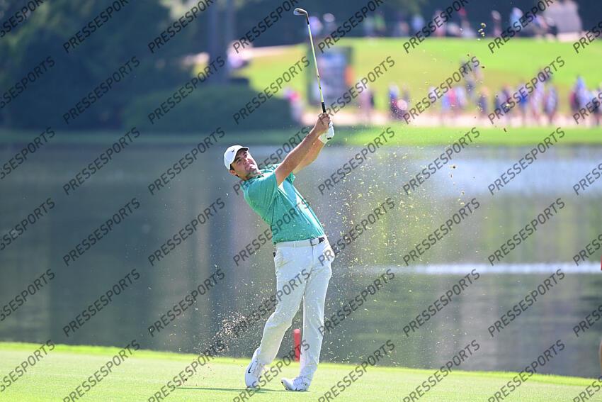 Aug 28, 2022; Atlanta, Georgia, USA; Scottie Scheffler hits from the 8th fairway during the final round of the TOUR Championship golf tournament. Mandatory Credit: Adam Hagy-USA TODAY Sports FINALE FEDEX CUP 