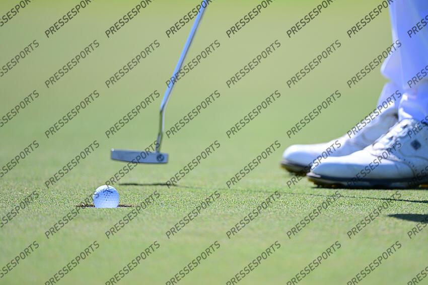 Aug 27, 2022; Atlanta, Georgia, USA; Close up of Patrick Cantlay’s going in the hole on the 1st green during the third round of the TOUR Championship golf tournament. Mandatory Credit: Adam Hagy-USA TODAY Sports FINALE FEDEX CUP 