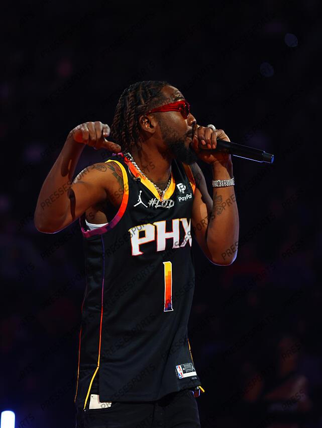 Oct 19, 2022; Phoenix, Arizona, USA; Recording artist Desiigner performs during halftime of the Phoenix Suns game against the Dallas Mavericks at Footprint Center. Mandatory Credit: Mark J. Rebilas-USA TODAY Sports NBA: Dallas Mavericks at Phoenix Suns 