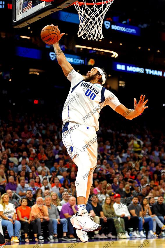 Oct 19, 2022; Phoenix, Arizona, USA; Dallas Mavericks center JaVale McGee (00) grabs a rebound during the second quarter against the Phoenix Suns at Footprint Center. Mandatory Credit: Mark J. Rebilas-USA TODAY Sports NBA: Dallas Mavericks at Phoenix Suns 