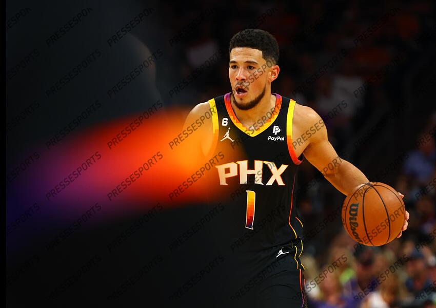 Oct 19, 2022; Phoenix, Arizona, USA; Phoenix Suns guard Devin Booker (1) against the Dallas Mavericks at Footprint Center. Mandatory Credit: Mark J. Rebilas-USA TODAY Sports NBA: Dallas Mavericks at Phoenix Suns 