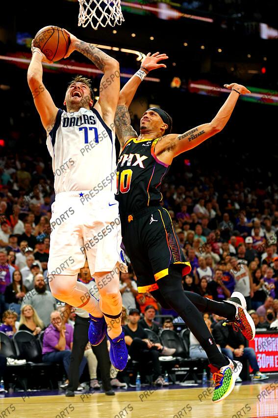 Oct 19, 2022; Phoenix, Arizona, USA; Dallas Mavericks guard Luka Doncic (77) shoots the ball against Phoenix Suns guard Damion Lee (10) during the fourth quarter at Footprint Center. Mandatory Credit: Mark J. Rebilas-USA TODAY Sports NBA: Dallas Mavericks at Phoenix Suns 