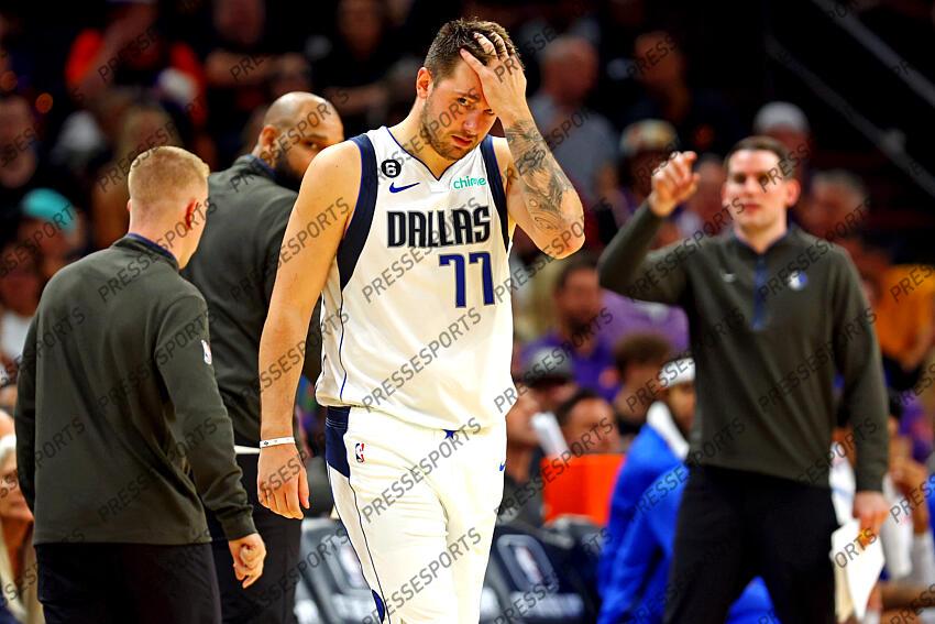 Oct 19, 2022; Phoenix, Arizona, USA; Dallas Mavericks guard Luka Doncic (77) reacts during the fourth quarter against the Phoenix Suns at Footprint Center. Mandatory Credit: Mark J. Rebilas-USA TODAY Sports NBA: Dallas Mavericks at Phoenix Suns 