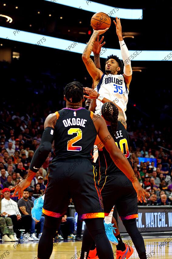 Oct 19, 2022; Phoenix, Arizona, USA; Dallas Mavericks center Christian Wood (35) shoots the ball against Phoenix Suns guard Damion Lee (10) and forward Josh Okogie (2) during the fourth quarter at Footprint Center. Mandatory Credit: Mark J. Rebilas-USA TODAY Sports NBA: Dallas Mavericks at Phoenix Suns 