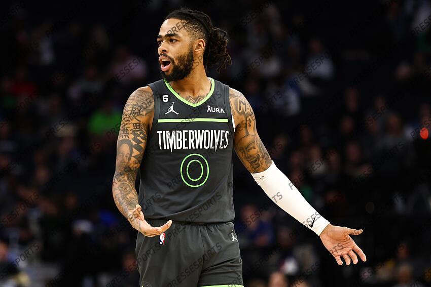 Dec 3, 2022; Minneapolis, Minnesota, USA; Minnesota Timberwolves guard D'Angelo Russell (0) reacts during the fourth quarter against the Oklahoma City Thunder at Target Center. Mandatory Credit: Matt Krohn-USA TODAY Sports 03 DECEMBRE 