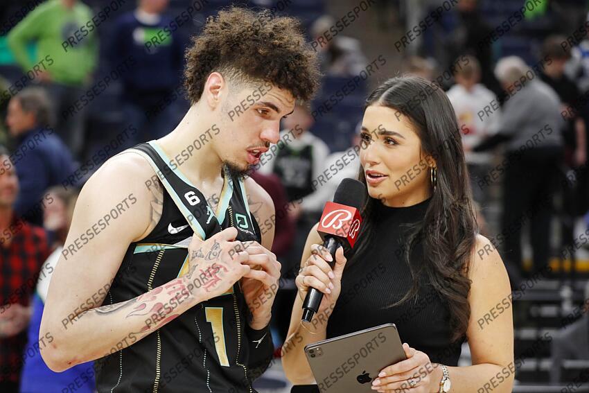 Feb 24, 2023; Minneapolis, Minnesota, USA; Charlotte Hornets guard LaMelo Ball (1) conducts an interview with Ashley ShahAhmadi after the game against the Minnesota Timberwolves at Target Center. Mandatory Credit: Bruce Kluckhohn-USA TODAY Sports NBA: Charlotte Hornets at Minnesota Timberwolves 