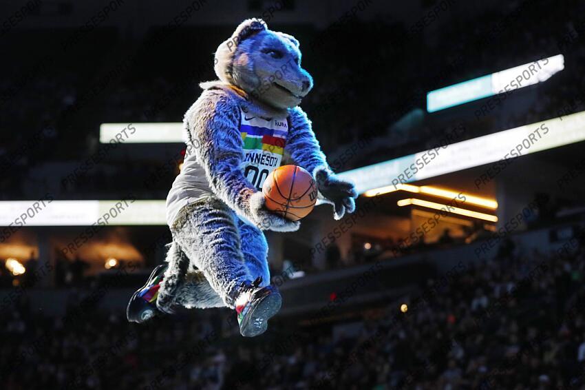 Feb 24, 2023; Minneapolis, Minnesota, USA; Minnesota Timberwolves mascot Crunch performs during a timeout between the team and the Charlotte Hornets in the third quarter at Target Center. Mandatory Credit: Bruce Kluckhohn-USA TODAY Sports NBA: Charlotte Hornets at Minnesota Timberwolves 