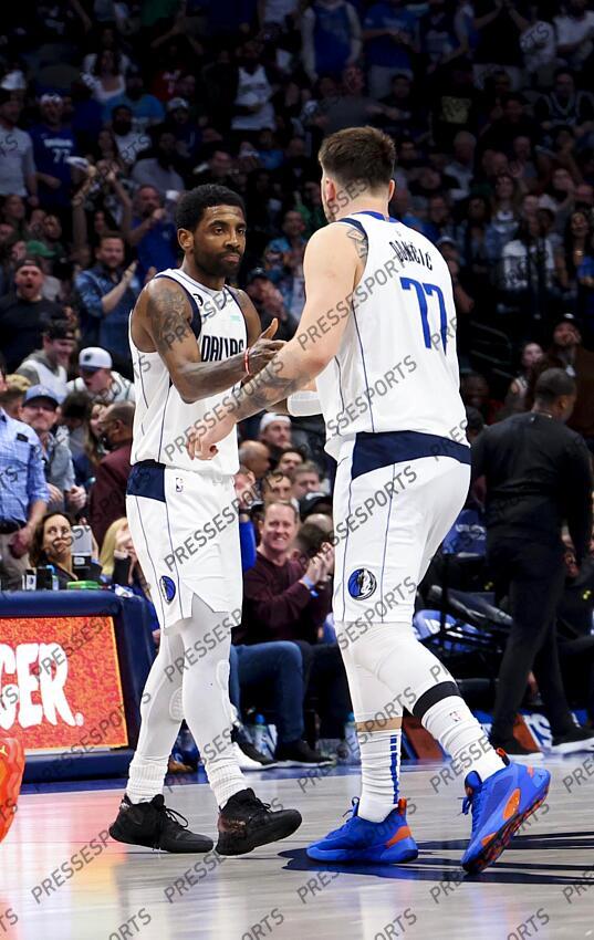 Mar 7, 2023; Dallas, Texas, USA; Dallas Mavericks guard Kyrie Irving (2) and Dallas Mavericks guard Luka Doncic (77) celebrate during the fourth quarter against the Utah Jazz at American Airlines Center. Mandatory Credit: Kevin Jairaj-USA TODAY Sports NBA: Utah Jazz at Dallas Mavericks 