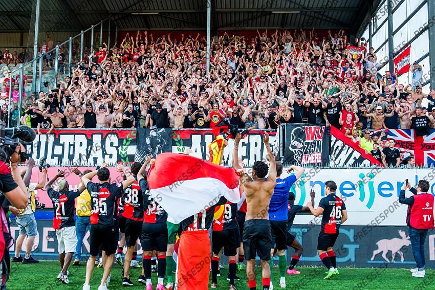 EMMEN - Almere City FC players and supporters celebrate the promotion to the premier league during the play-off promotion/relegation match between FC Emmen and Almere City FC at De Oude Meerdijk on June 11, 2023 in Emmen, Netherlands. ANP COR LASKER FC EMMEN-ALMERE CITY FC (1-2) 