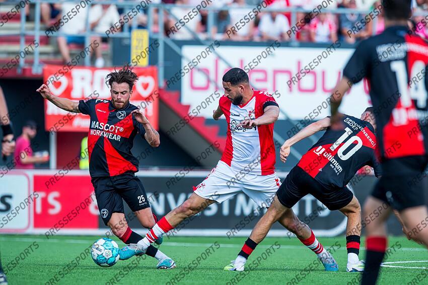 EMMEN - (lr) Jorrit Smeets of Almere City FC, Ahmed El Messaoudi of FC Emmen, Lance Duijvestijn of Almere City FC during the play-off promotion/relegation match between FC Emmen and Almere City FC at De Oude Meerdijk on June 11, 2023 in Emmen, Netherlands. ANP COR LASKER FC EMMEN-ALMERE CITY FC (1-2) 