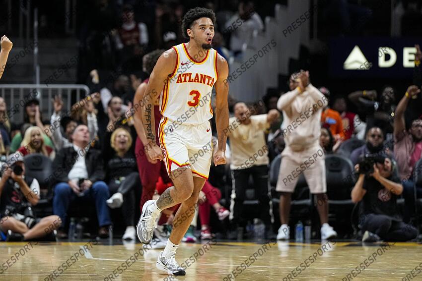 Oct 10, 2023; Atlanta, Georgia, USA; Atlanta Hawks forward Seth Lundy (3) reacts after a three point shot against the Cleveland Cavaliers during the second half at State Farm Arena. Mandatory Credit: Dale Zanine-USA TODAY Sports NBA: Preseason-Cleveland Cavaliers at Atlanta Hawks 