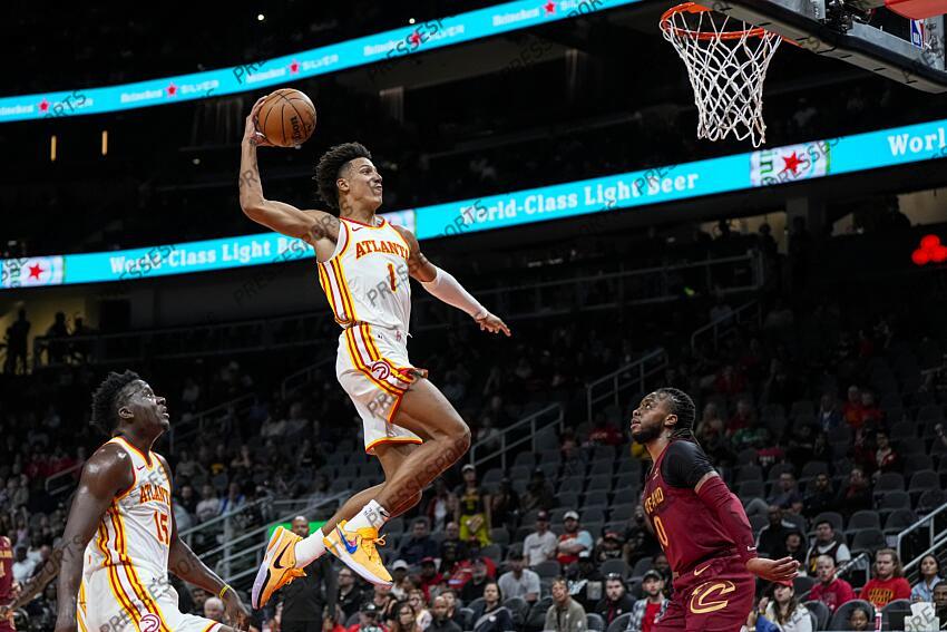 Oct 10, 2023; Atlanta, Georgia, USA; Atlanta Hawks forward Jalen Johnson (1) dunks against the Cleveland Cavaliers during the first half at State Farm Arena. Mandatory Credit: Dale Zanine-USA TODAY Sports NBA: Preseason-Cleveland Cavaliers at Atlanta Hawks 