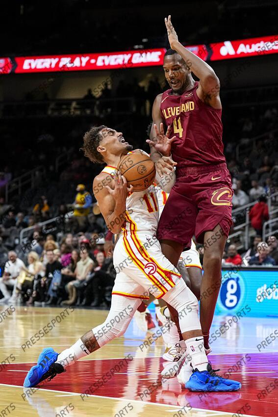 Oct 10, 2023; Atlanta, Georgia, USA; Atlanta Hawks guard Trae Young (11) tries to drive to the basket defended by Cleveland Cavaliers forward Evan Mobley (4) during the first half at State Farm Arena. Mandatory Credit: Dale Zanine-USA TODAY Sports NBA: Preseason-Cleveland Cavaliers at Atlanta Hawks 