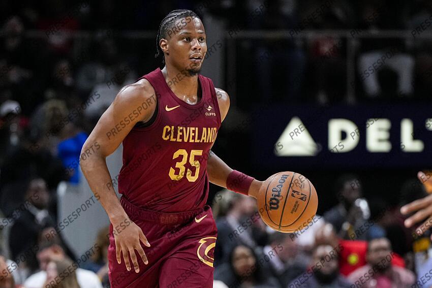 Oct 10, 2023; Atlanta, Georgia, USA; Cleveland Cavaliers forward Isaac Okoro (35) brings the ball up the court against the Atlanta Hawks during the second half at State Farm Arena. Mandatory Credit: Dale Zanine-USA TODAY Sports NBA: Preseason-Cleveland Cavaliers at Atlanta Hawks 
